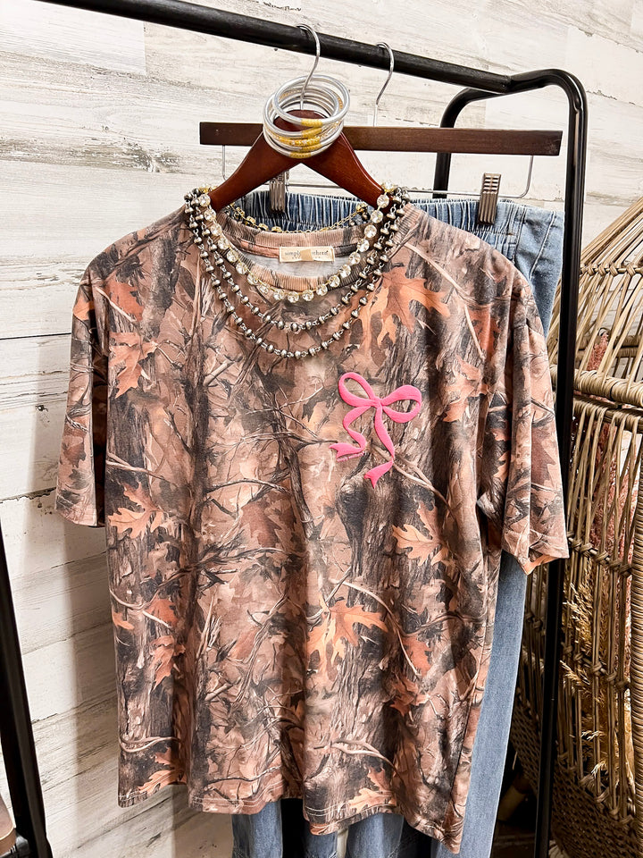 Simply Southern | Southern Belle Front &amp; Back Pink Bow Short Sleeve Graphic T-Shirt in Camouflage