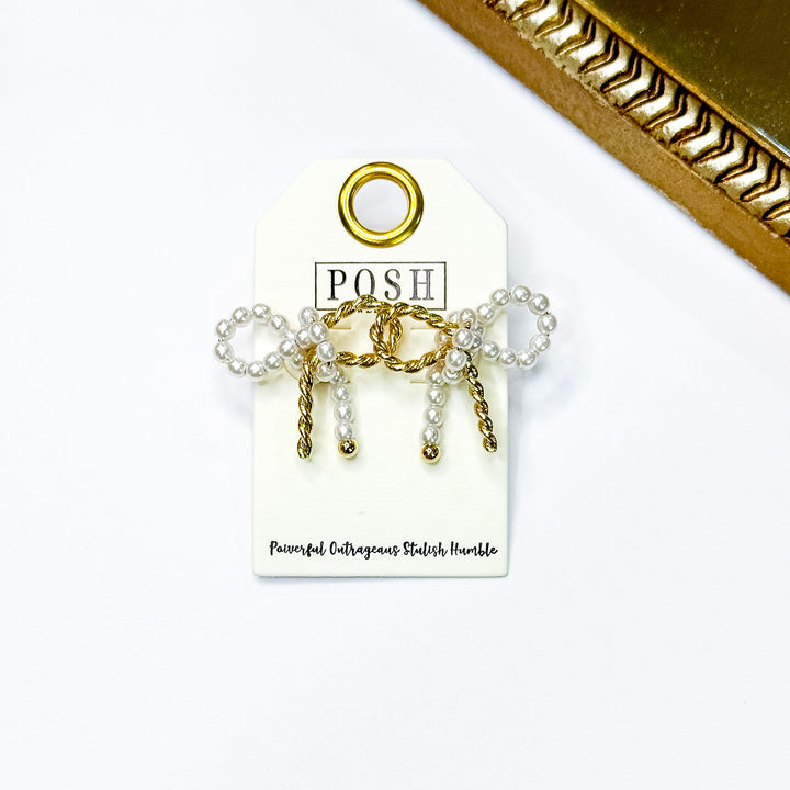 Posh by Pink Panache | Twisted Bliss Gold Tone Pearl Bow Stud Earrings