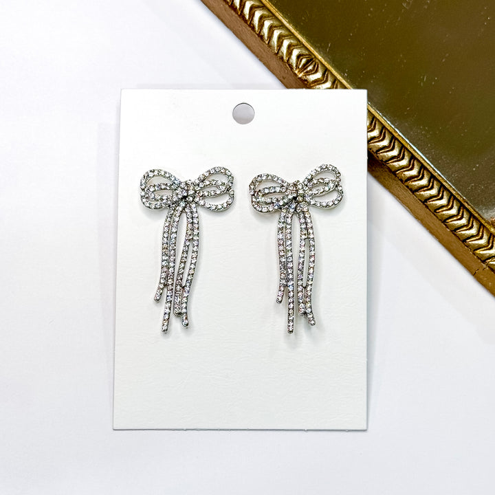 Radiant Ribbons Silver Tone Clear Rhinestone Bow Earrings