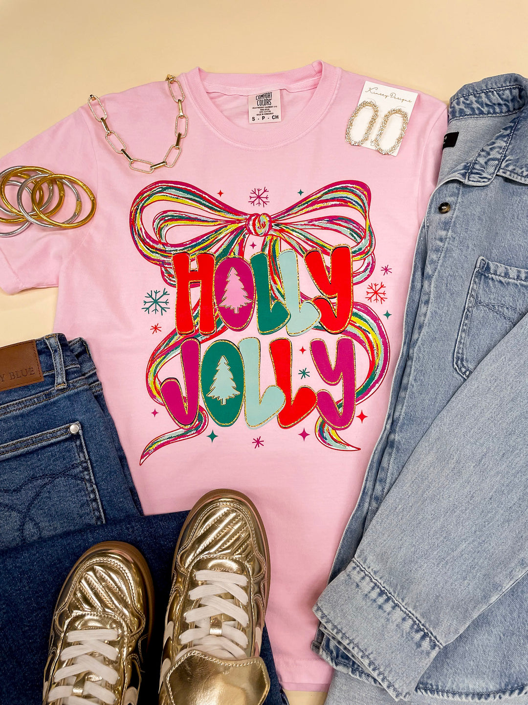 Last Chance Size 3XL | Holly Jolly Colorful Bow Christmas Graphic on Short Sleeve Comfort Color Tee in Pink - Giddy Up Glamour Boutique