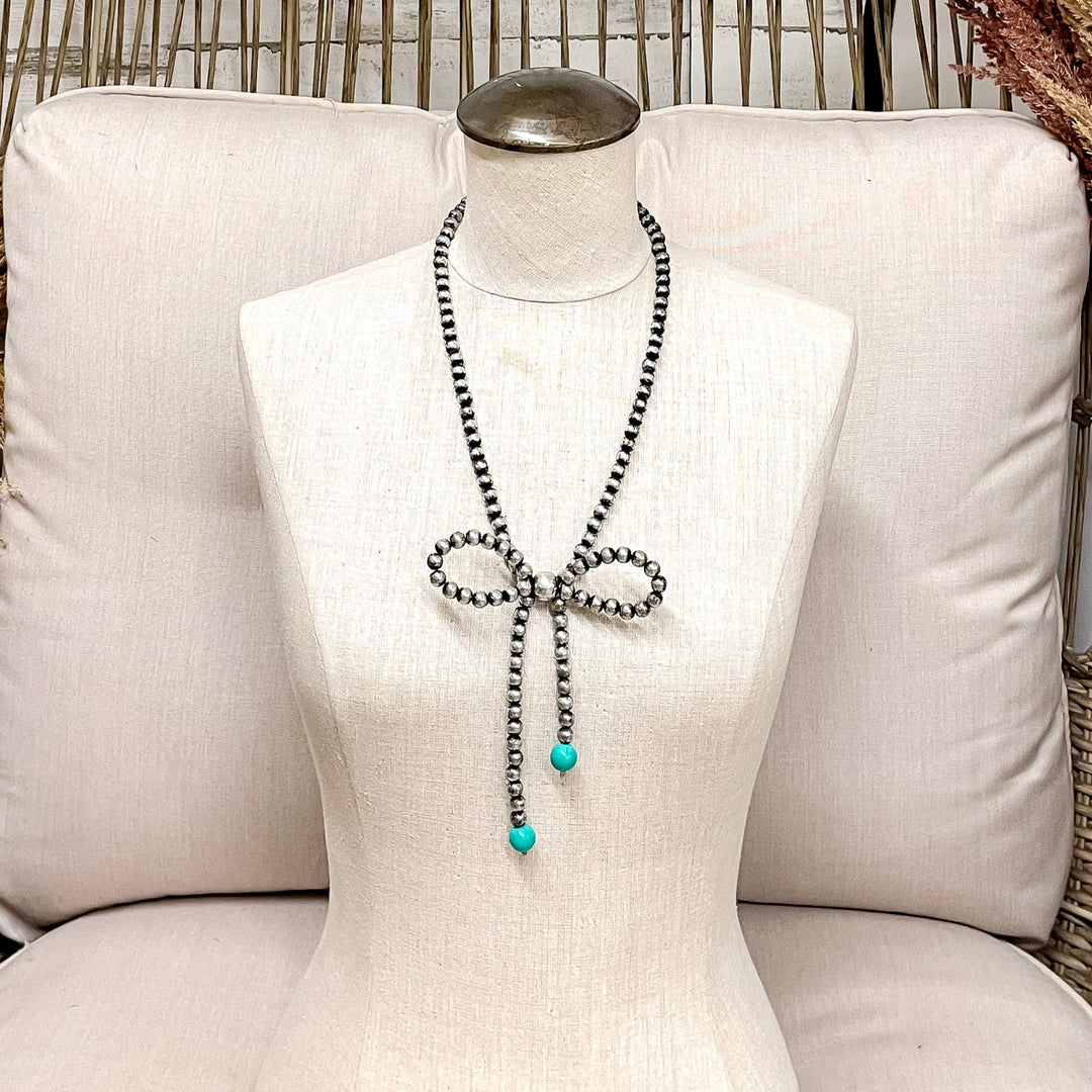 Oh My Bow Silver Beaded Bow Necklace with Turquoise Accents
