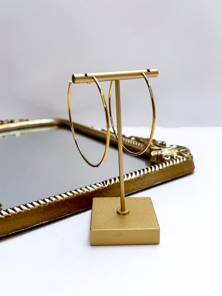 CHANSUTT PEARLS | Thin Large Hoop Earrings in Gold