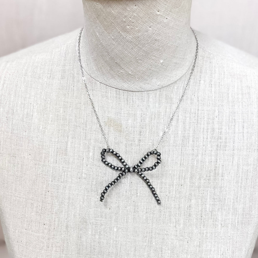 Blame It on the Bow Pearl Necklace in Silver