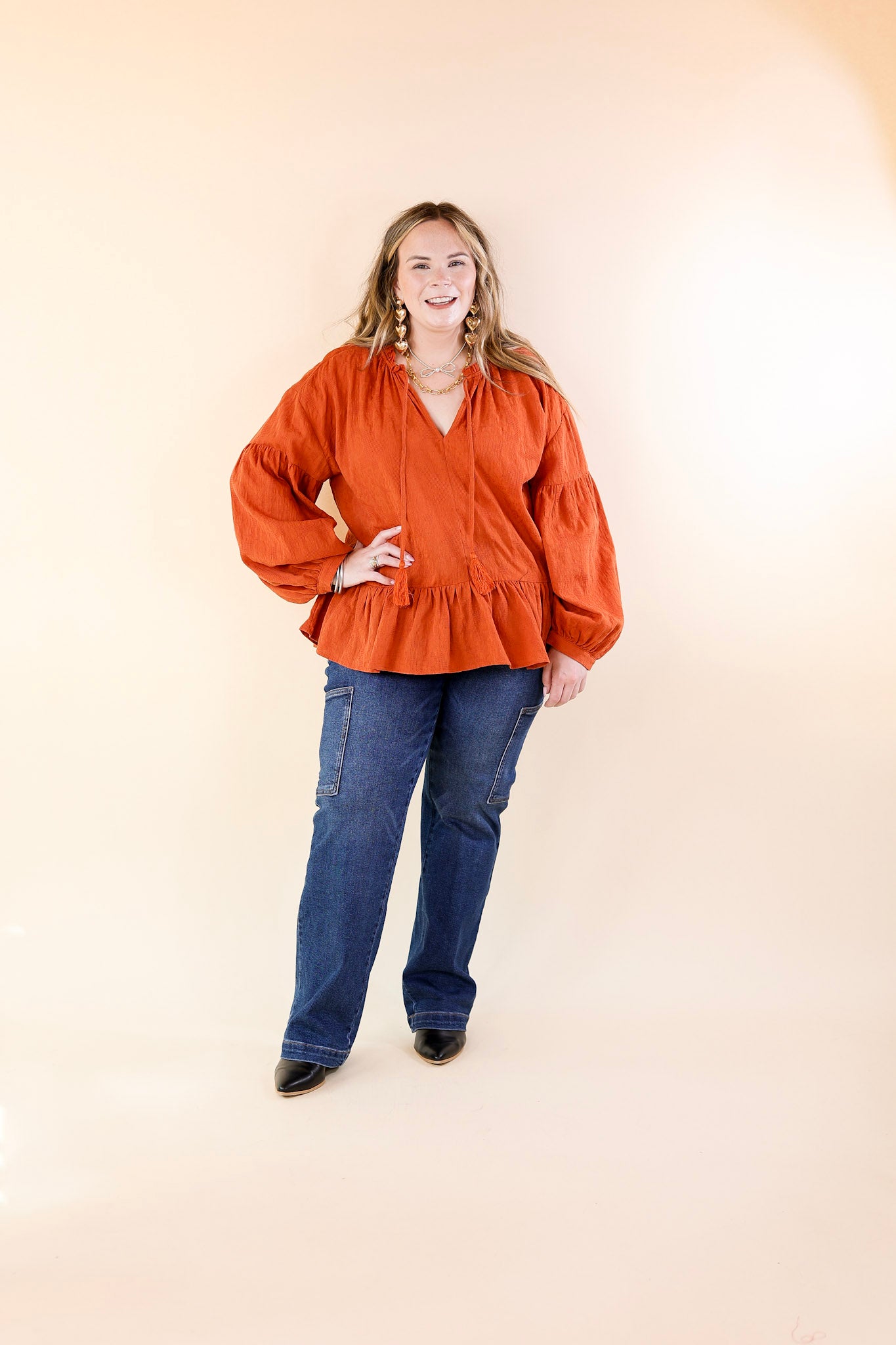 Free Fallin' Textured Long Sleeve Peplum Top with Keyhole Front in Orange