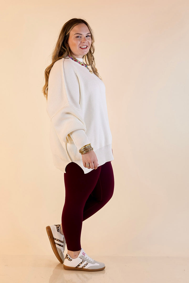 Snug and Stylish Mock Neck Sweater with Side Slit in Ivory