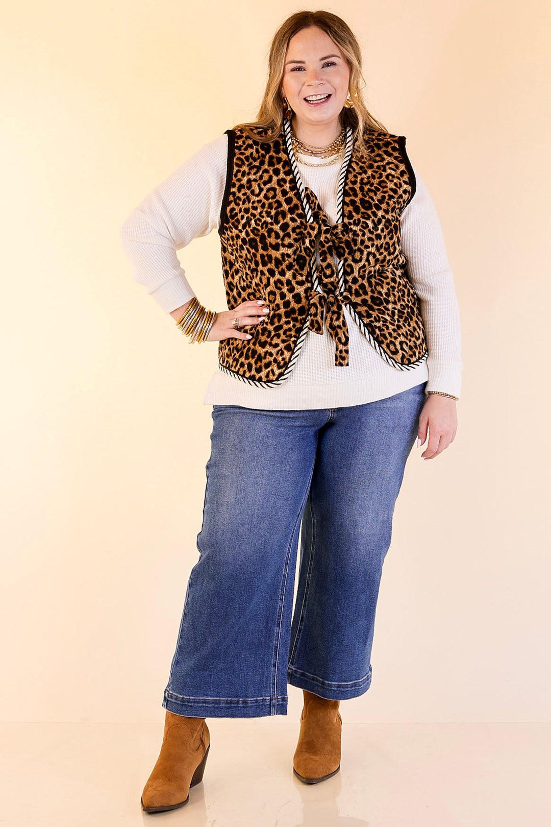 Wildly Chic Quilted Puffer Vest with Stripe Trim and Black Piping in Leopard Print