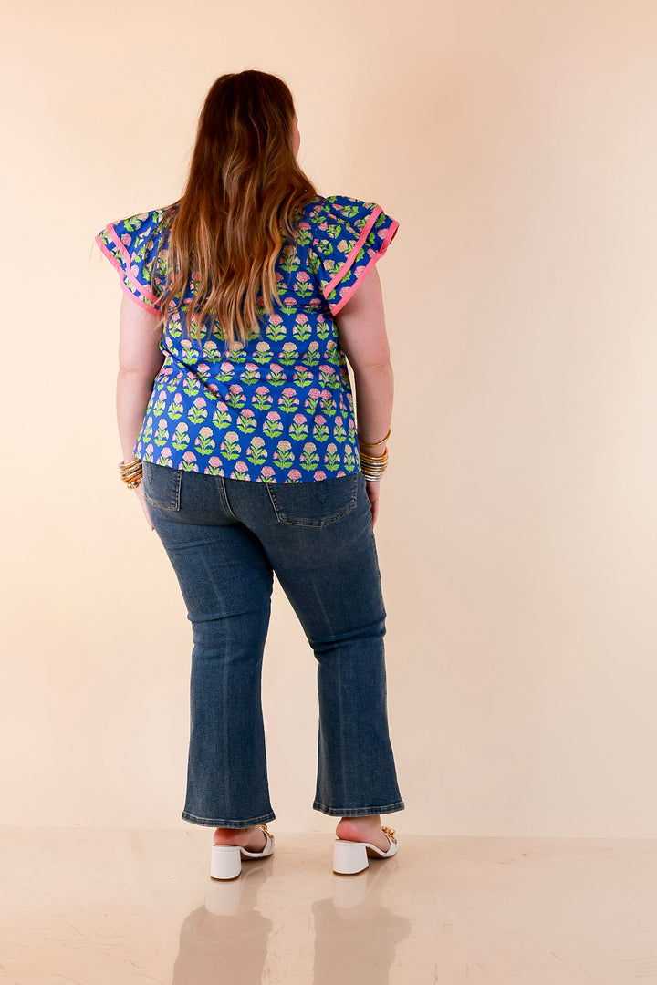 Fresh Perspective V Neck Floral Print Top with Ruffle Cap Flutter Sleeves and Contrast Trim in Royal Blue