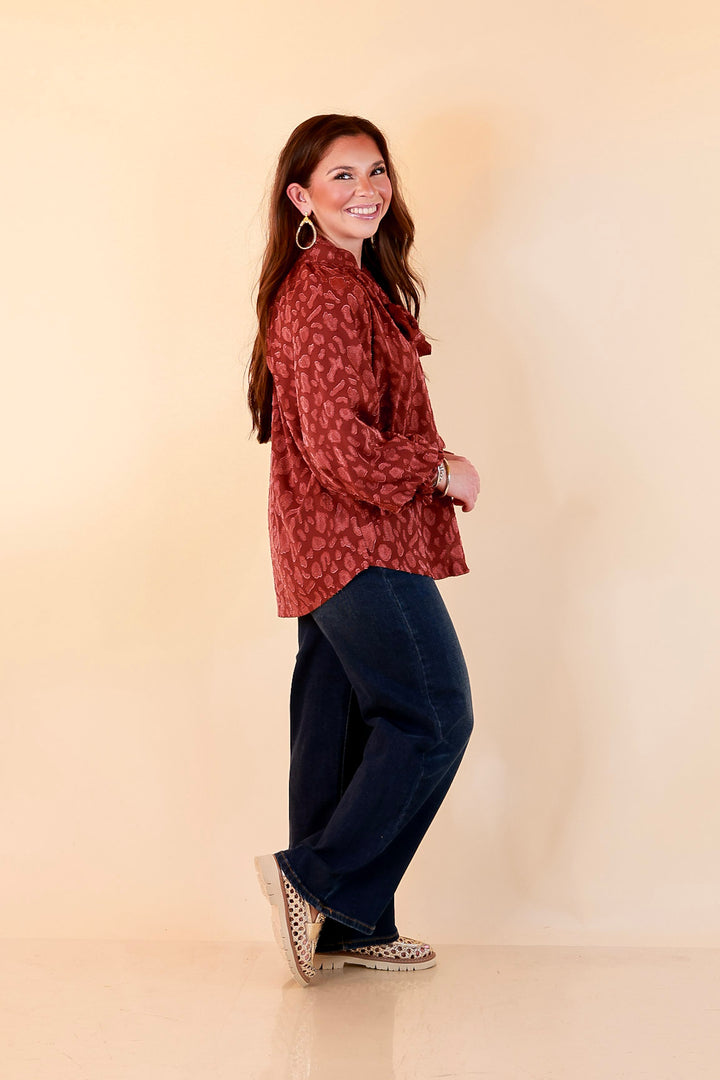 Commanding Attention Tie Neck Velvet Animal Print Balloon Sleeve Blouse in Burgundy