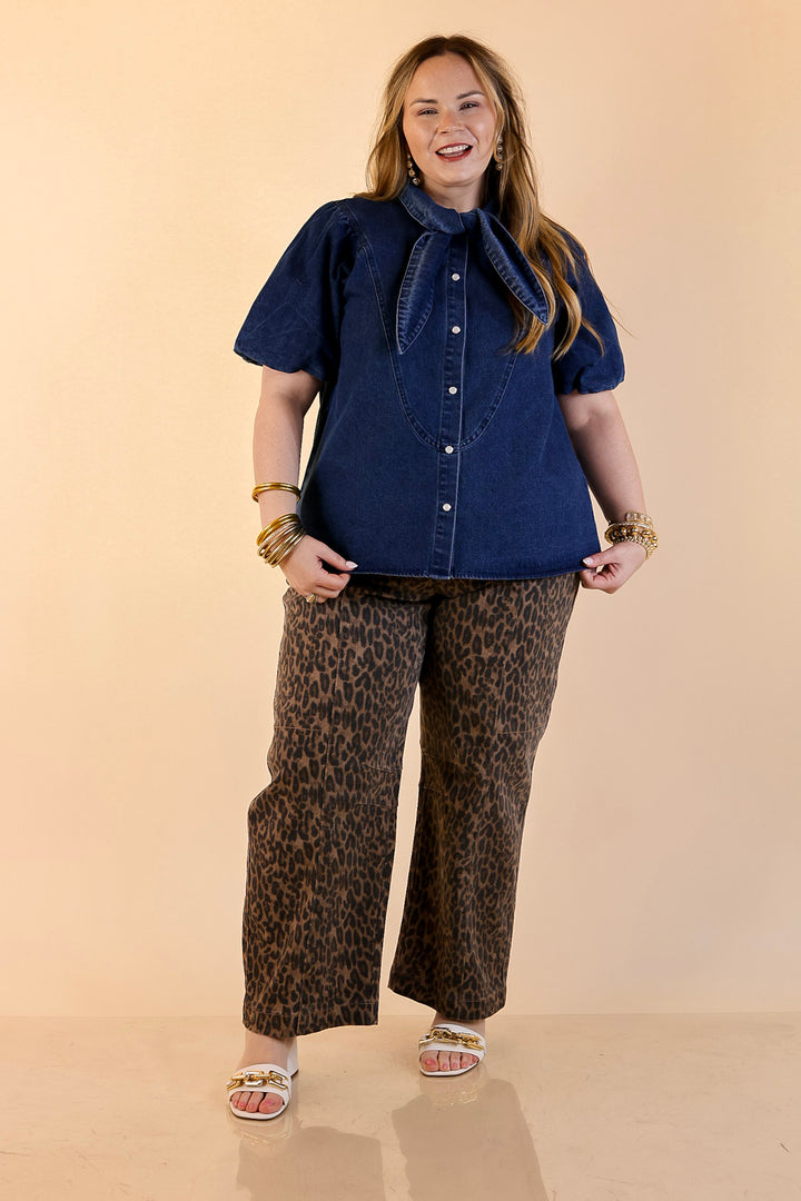 Tie the Moment Denim Pearl Snap Button Front Top with Statement Tie Neckline and Puff Sleeves in Medium Wash