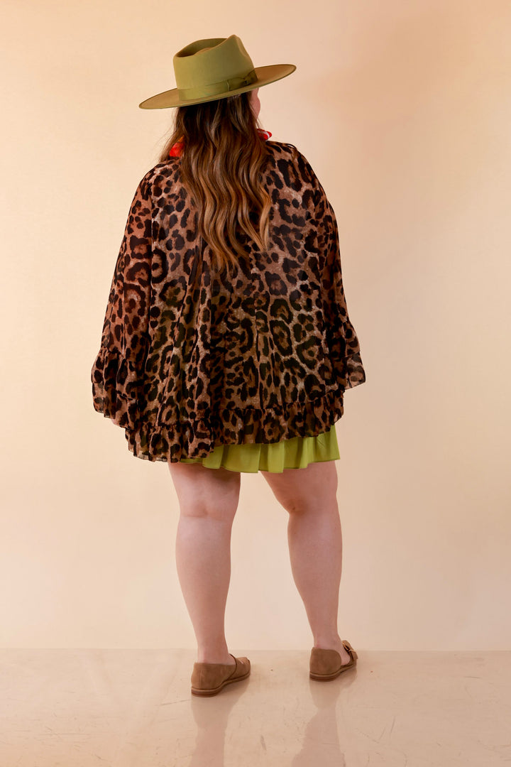 Flirt Factor Long Sleeve Sheer Blouse with Bell Sleeves and Ruffle Detailing and Tie Collar in Leopard Print