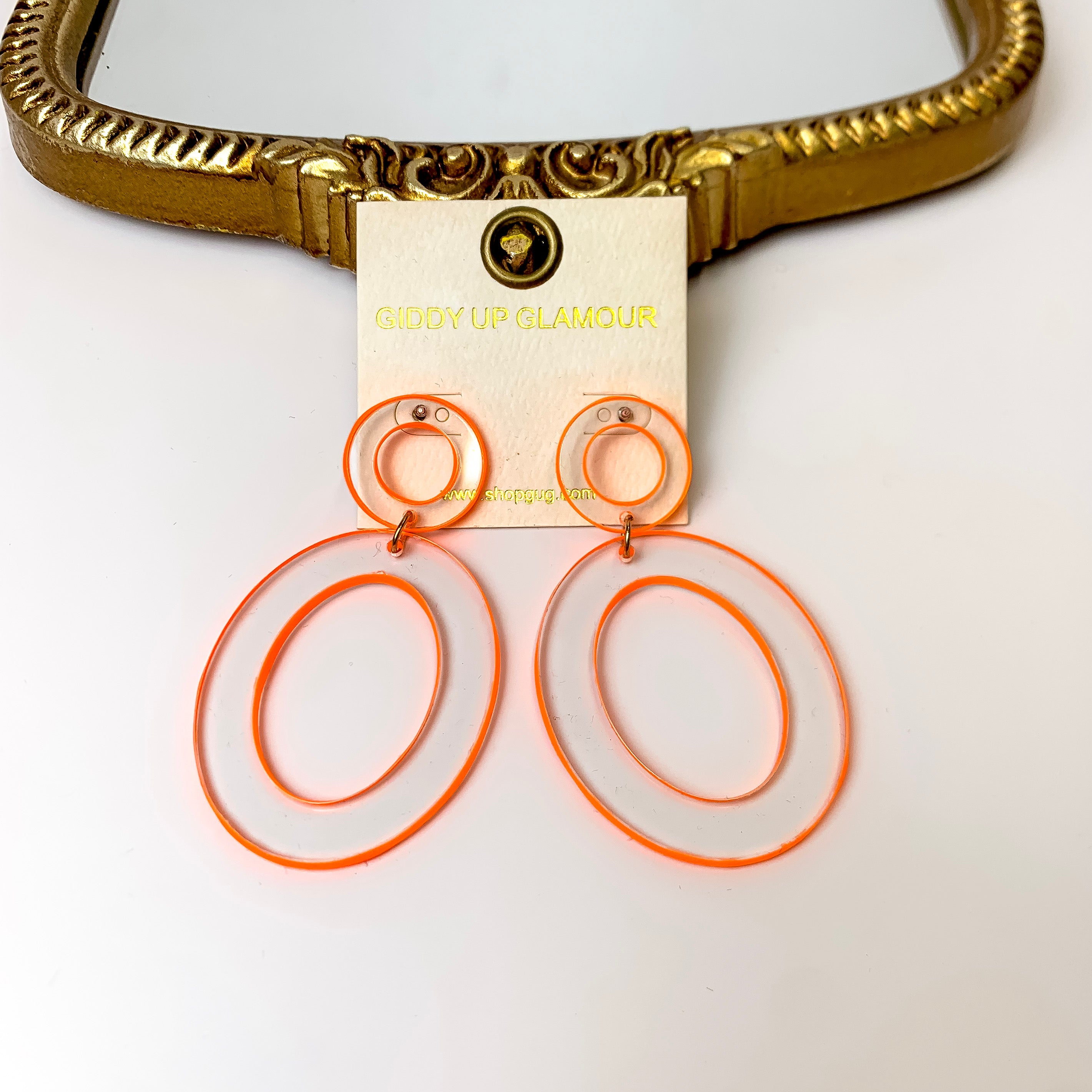 Clear Acrylic Oval Drop Earrings with Neon Orange Trim - Giddy Up Glamour Boutique