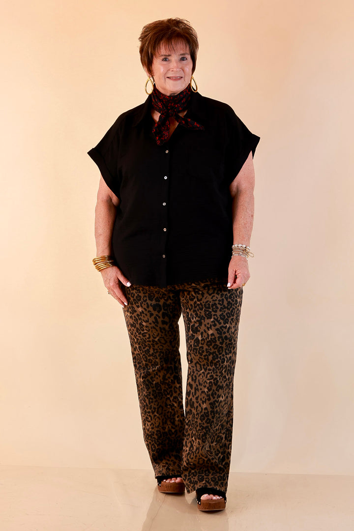 Timeless Appeal Woven Airflow Button Front Top with Rolled Cuff Short Sleeves and Front Pocket in Black