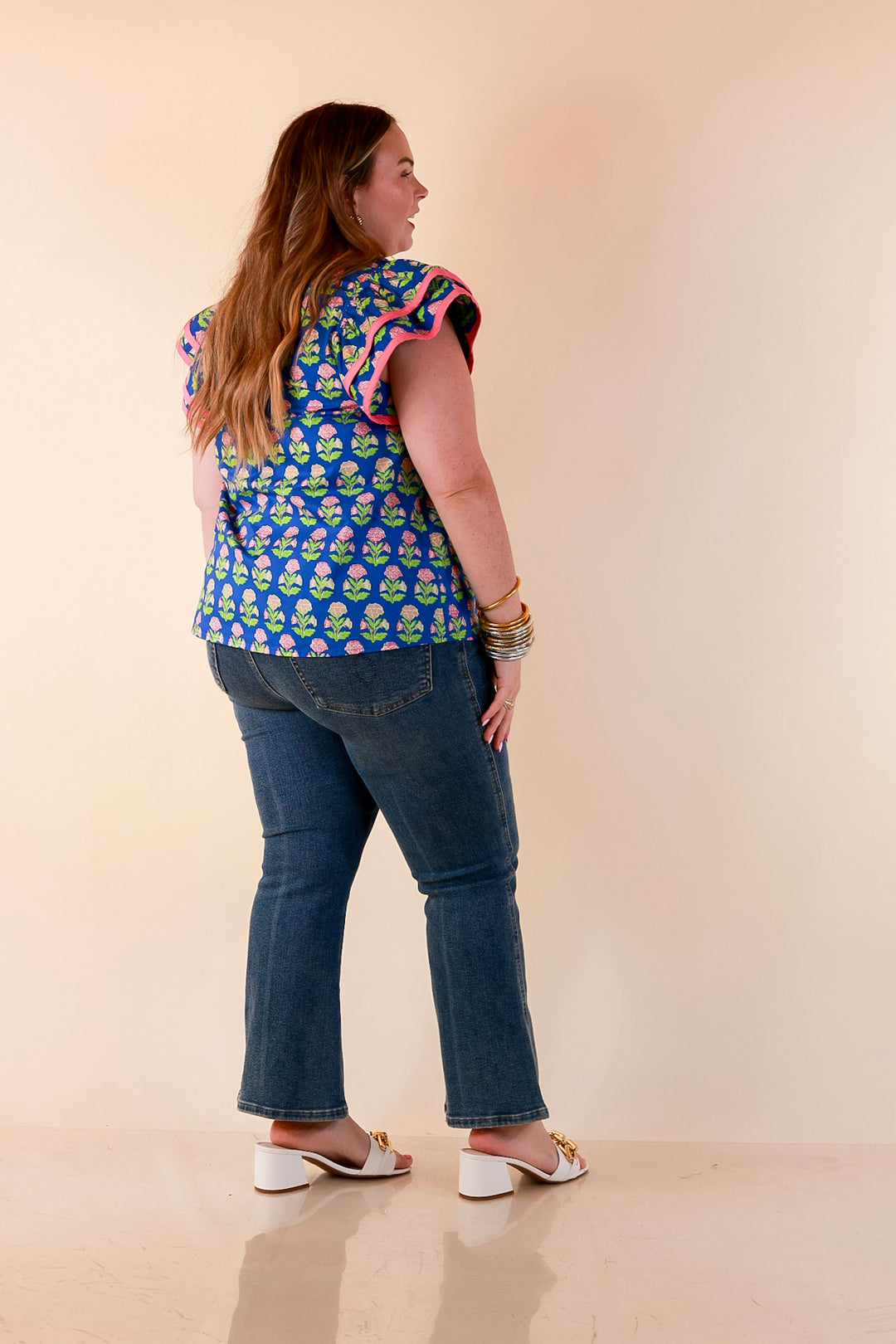 Fresh Perspective V Neck Floral Print Top with Ruffle Cap Flutter Sleeves and Contrast Trim in Royal Blue