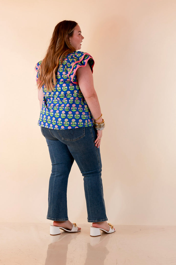 Fresh Perspective V Neck Floral Print Top with Ruffle Cap Flutter Sleeves and Contrast Trim in Royal Blue