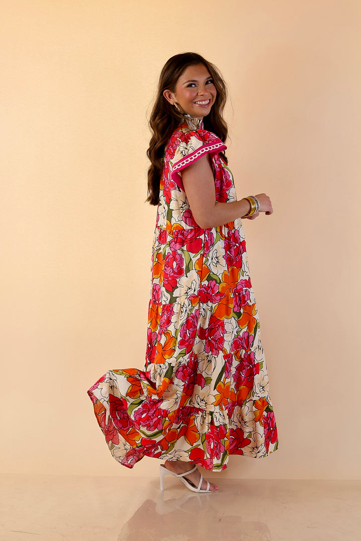Spring Symphony Floral Print Tiered Midi Dress with Flutter Sleeves in Pink and Orange