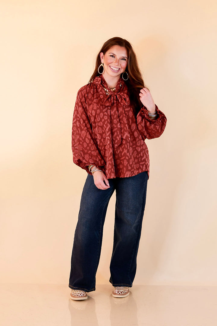Commanding Attention Tie Neck Velvet Animal Print Balloon Sleeve Blouse in Burgundy