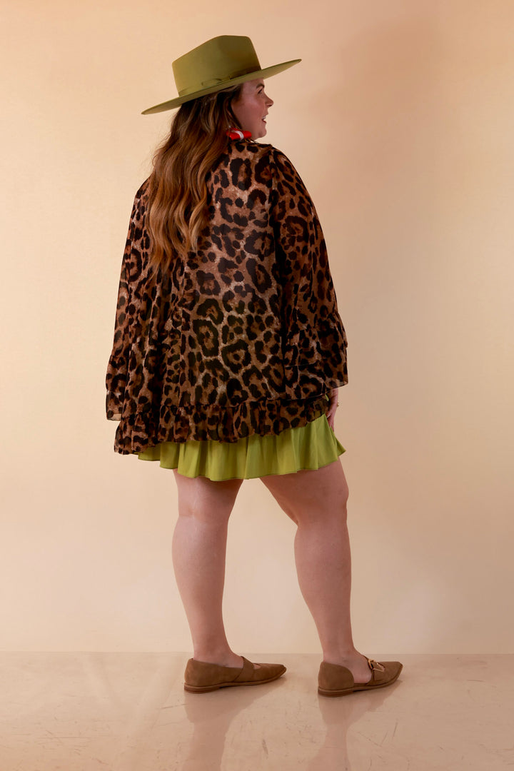 Flirt Factor Long Sleeve Sheer Blouse with Bell Sleeves and Ruffle Detailing and Tie Collar in Leopard Print