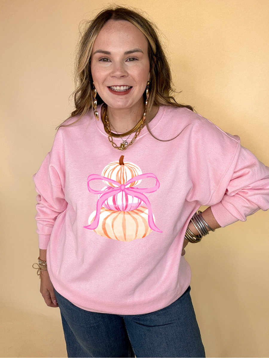 Online Exclusive | Chic Orange and Pink Pile of Pumpkins with Giant Pink Bow Graphic Sweatshirt in Multiple Colors