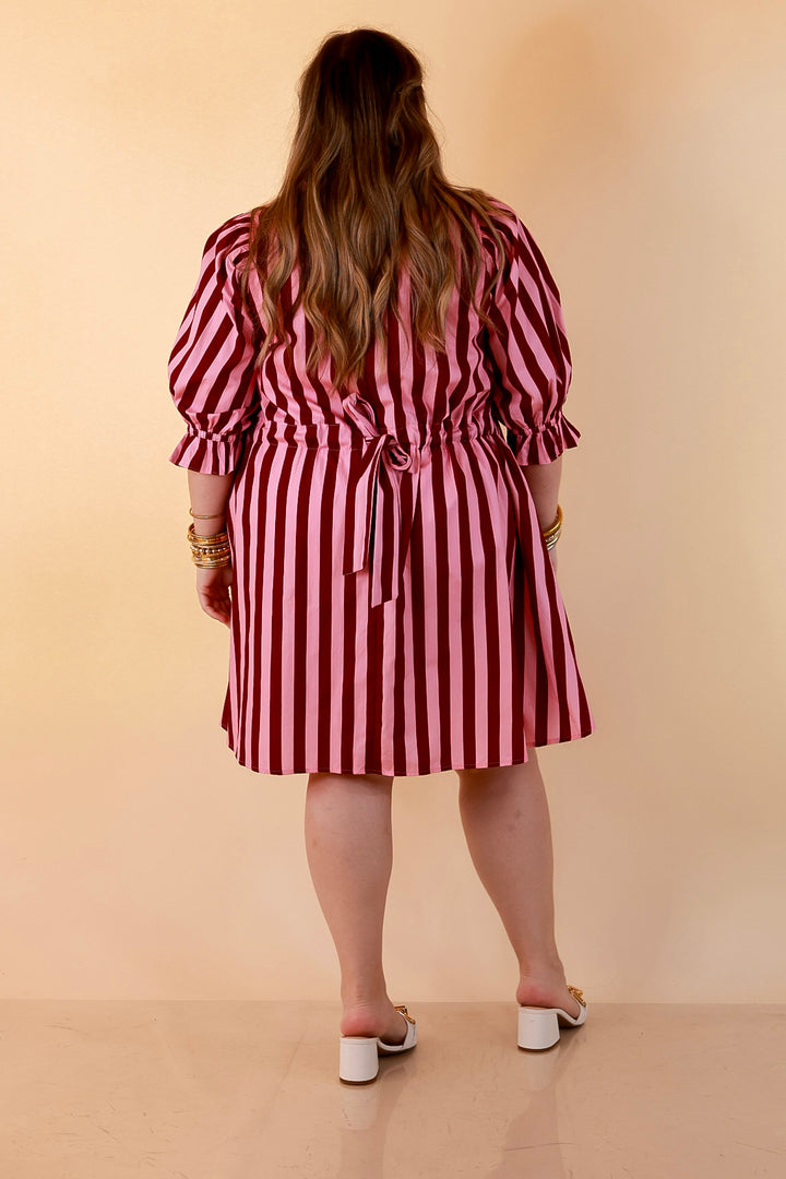 Talk of the Town Striped Ruffle Sleeve Babydoll Dress with Cinched Waist Feature in Maroon and Pink