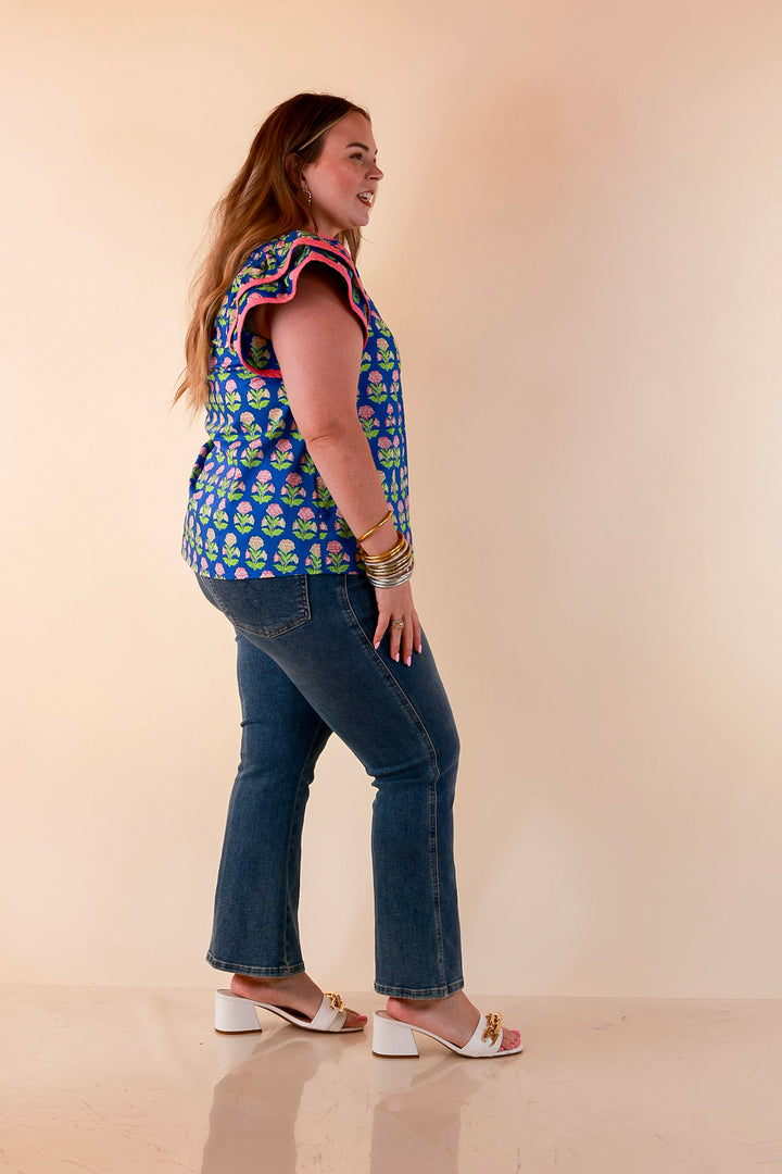 Fresh Perspective V Neck Floral Print Top with Ruffle Cap Flutter Sleeves and Contrast Trim in Royal Blue