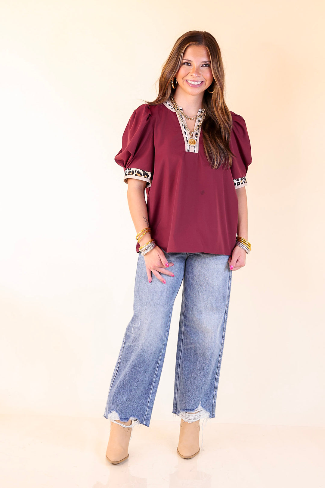 Standout Style V Neck Top with Short Balloon Sleeves and Leopard Print Trim in Maroon