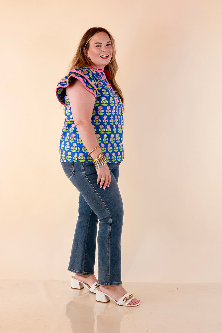 Fresh Perspective V Neck Floral Print Top with Ruffle Cap Flutter Sleeves and Contrast Trim in Royal Blue
