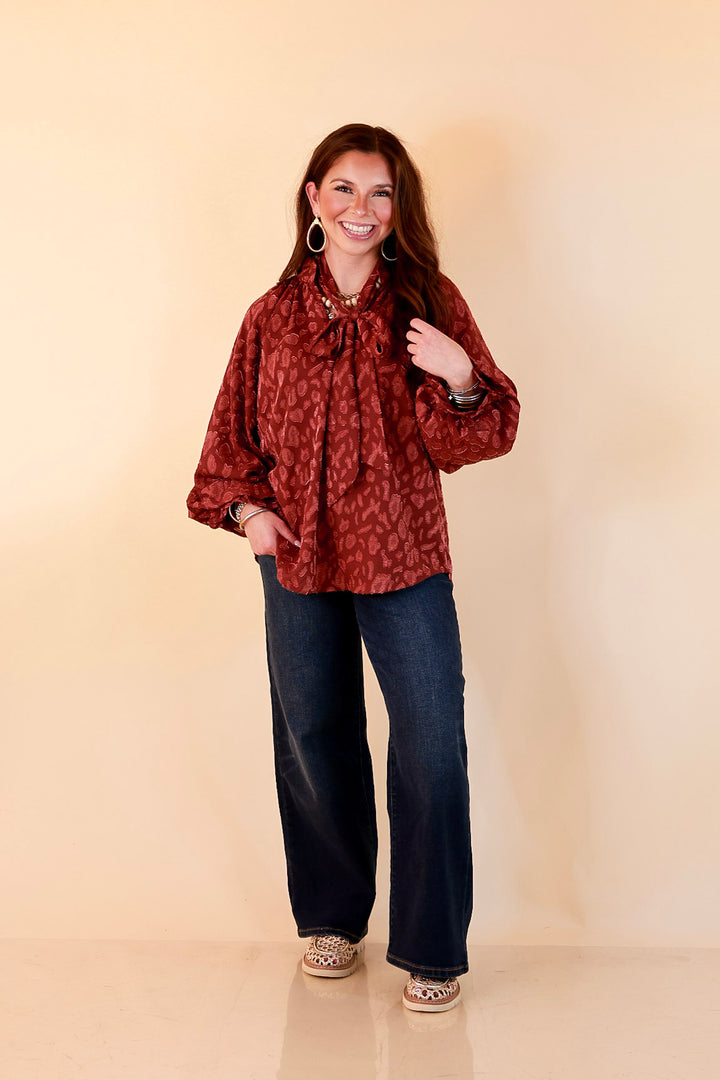 Commanding Attention Tie Neck Velvet Animal Print Balloon Sleeve Blouse in Burgundy