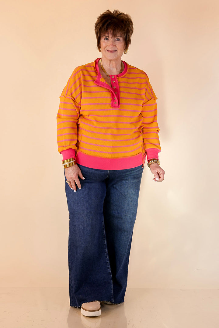 Casual Edge Long Sleeve Striped Henley Knit Top with Dropped Shoulders in Orange with Pink Stripes