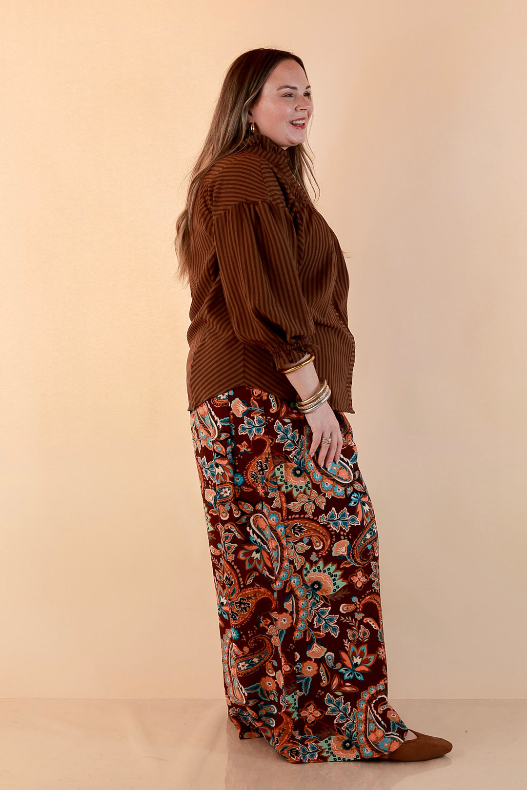 A Fine Line Smocked Ruffle Neck Long Sleeve Striped Button Front Blouse in Chocolate Brown