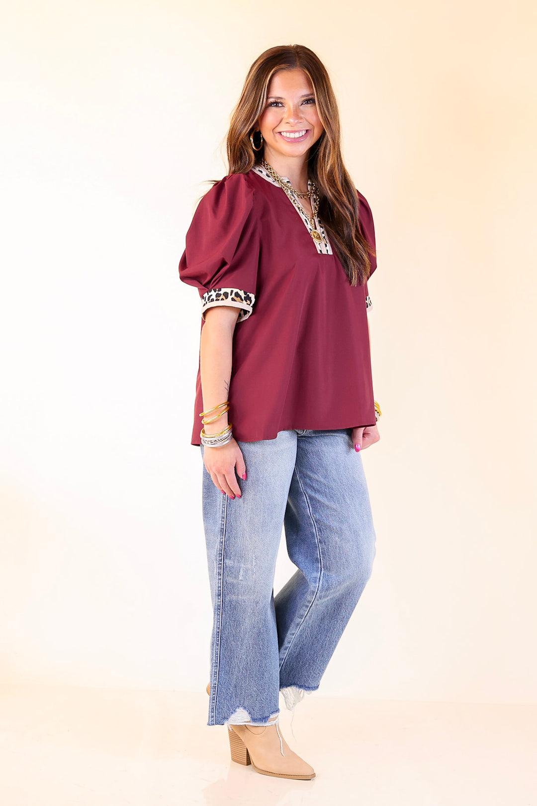 Standout Style V Neck Top with Short Balloon Sleeves and Leopard Print Trim in Maroon