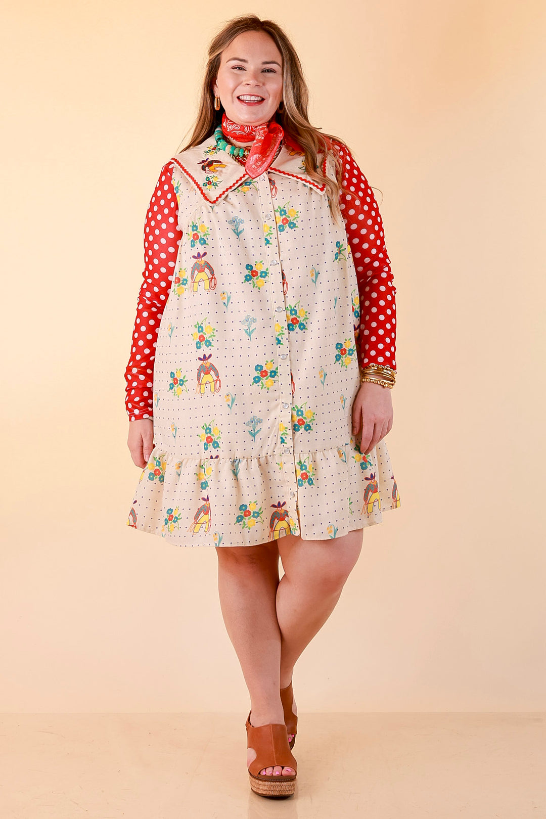 The Showstopper Sleeveless Pearl Snap Cowboy, Floral and Polka Dot Print Ruffle Dress with Sailor Collar and Cowboy Embroidery in Cream