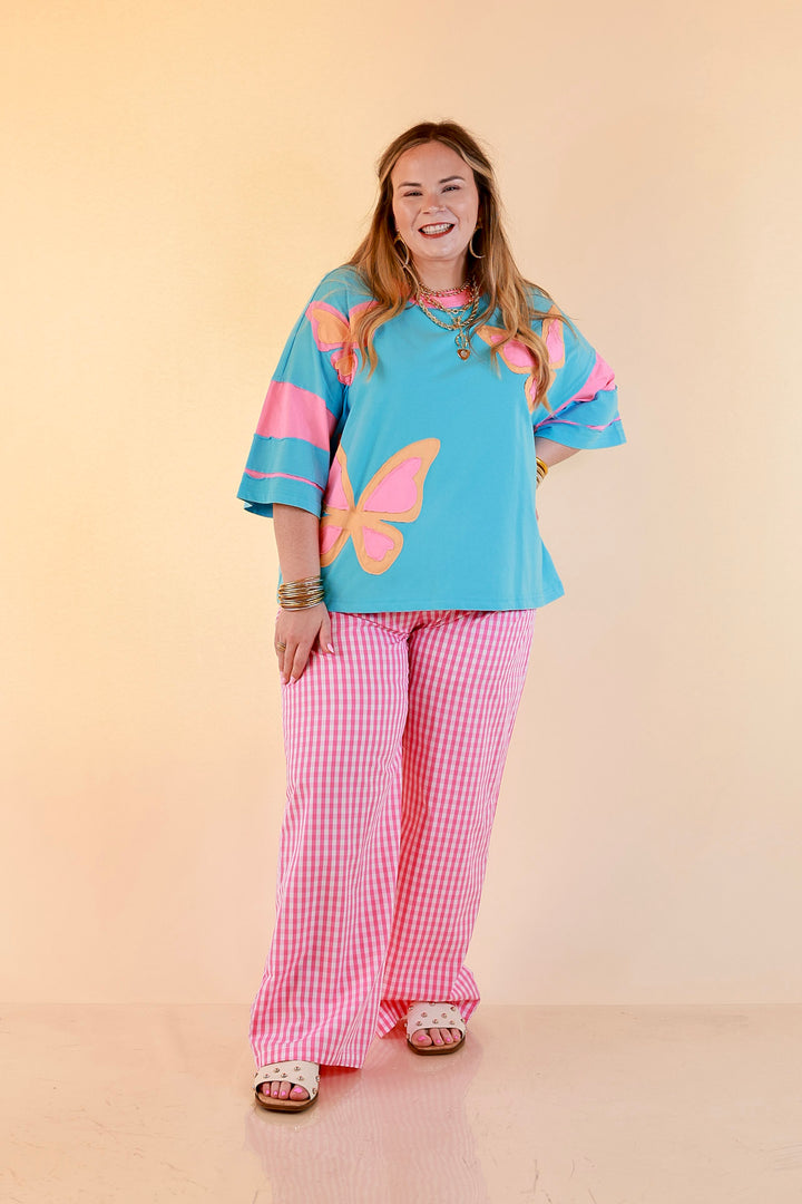 Dream in Color Butterfly Print Relaxed Short Sleeve Top with Contrast Sleeves in Turquoise Blue