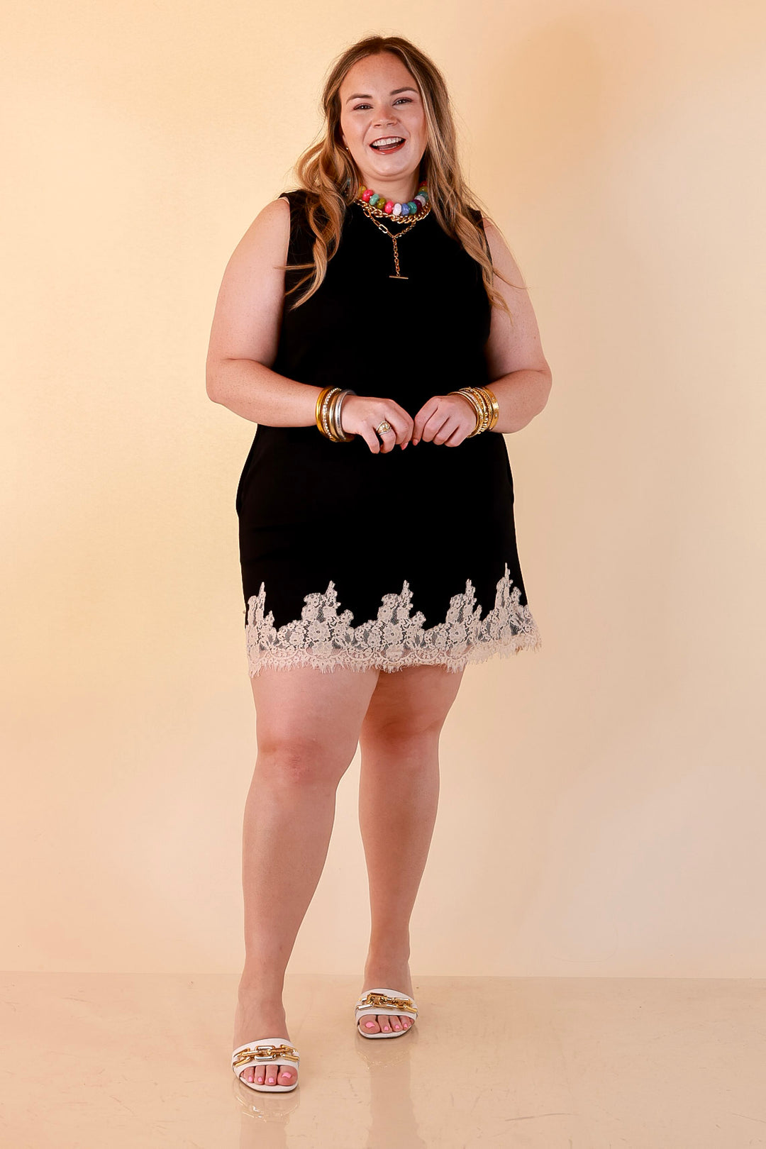 Just a Little Something Sleeveless Knit Mini Dress with Lace Trim in Black