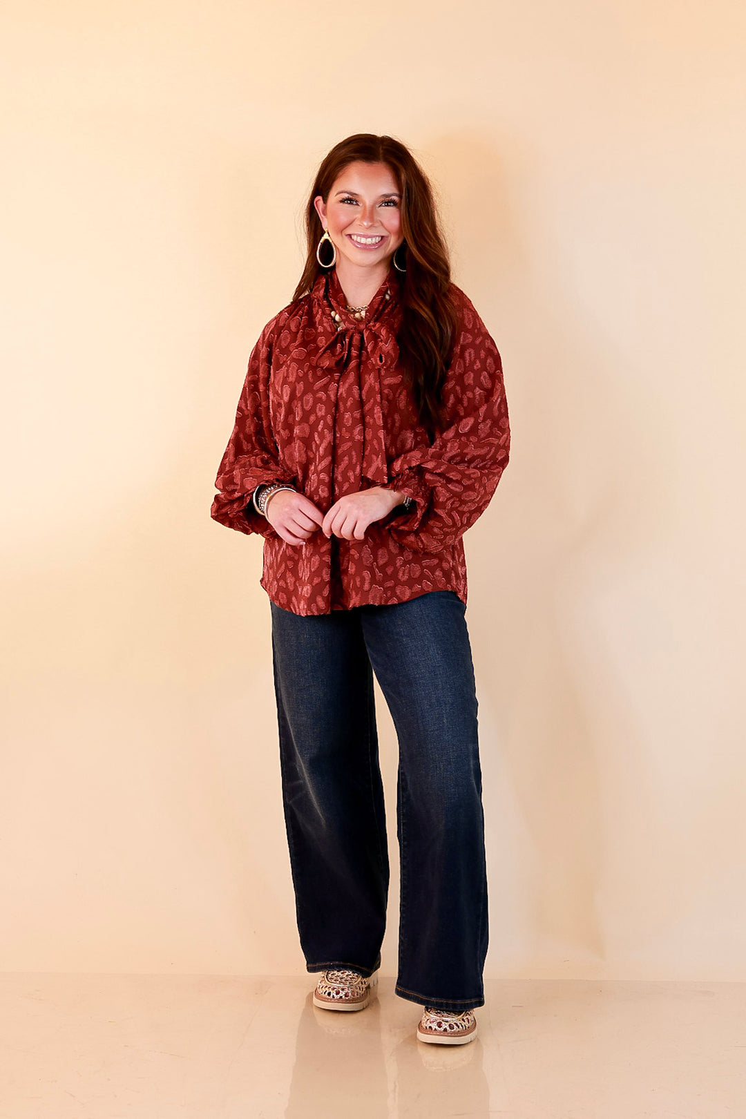Commanding Attention Tie Neck Velvet Animal Print Balloon Sleeve Blouse in Burgundy