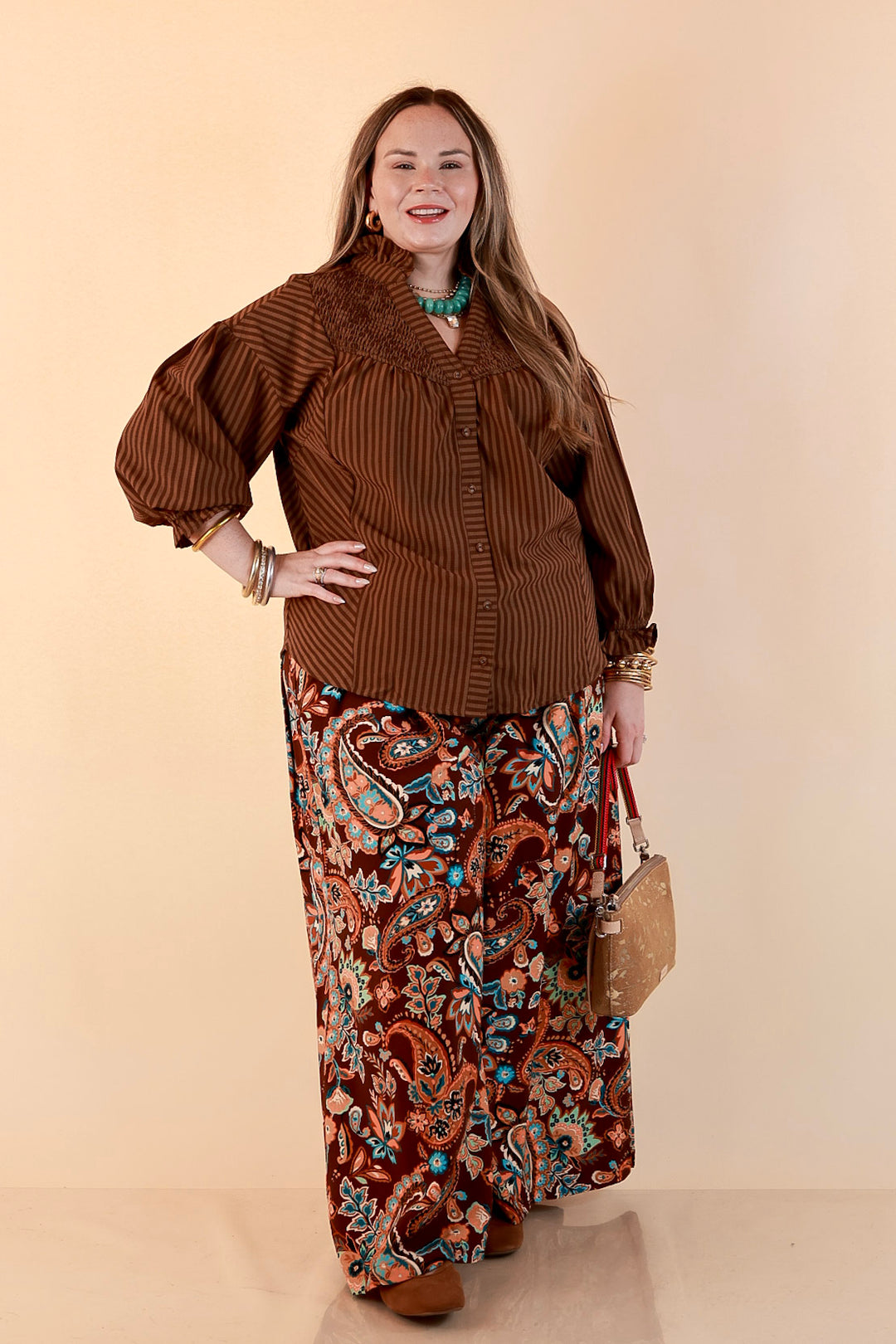 A Fine Line Smocked Ruffle Neck Long Sleeve Striped Button Front Blouse in Chocolate Brown