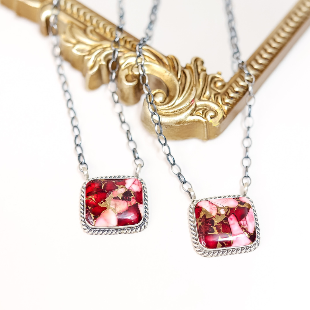 Square Rose Dahlia stone necklaces with rope-edge sterling silver settings on oxidized chains, handmade by Navajo artist Augustine Largo.