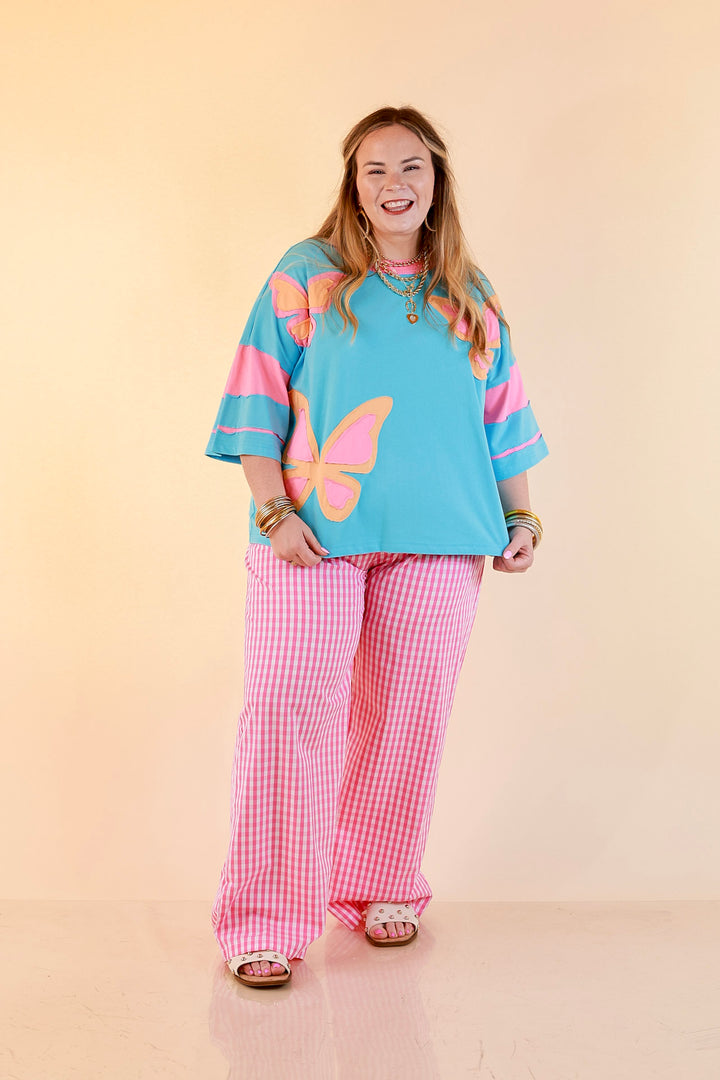 Dream in Color Butterfly Print Relaxed Short Sleeve Top with Contrast Sleeves in Turquoise Blue