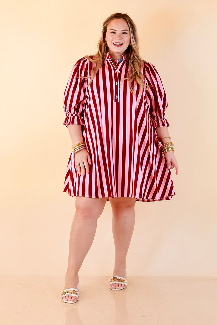 Talk of the Town Striped Ruffle Sleeve Babydoll Dress with Cinched Waist Feature in Maroon and Pink