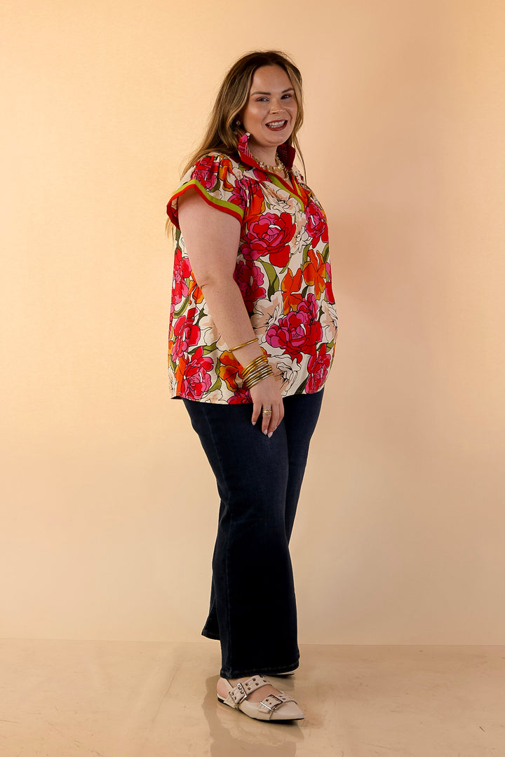 Spring Symphony Floral Print Flutter Sleeve Top with Contrast Trim Split Neckline in Pink and Orange