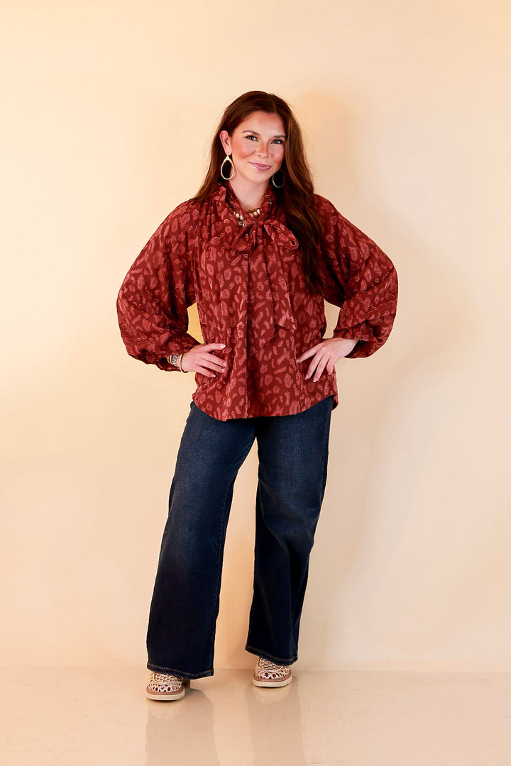 Commanding Attention Tie Neck Velvet Animal Print Balloon Sleeve Blouse in Burgundy