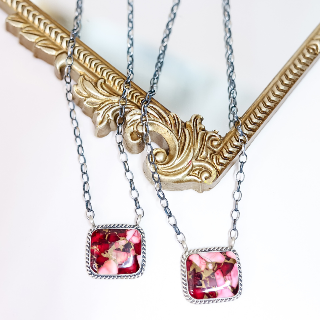 Square Rose Dahlia stone necklaces with rope-edge sterling silver settings on oxidized chains, handmade by Navajo artist Augustine Largo.