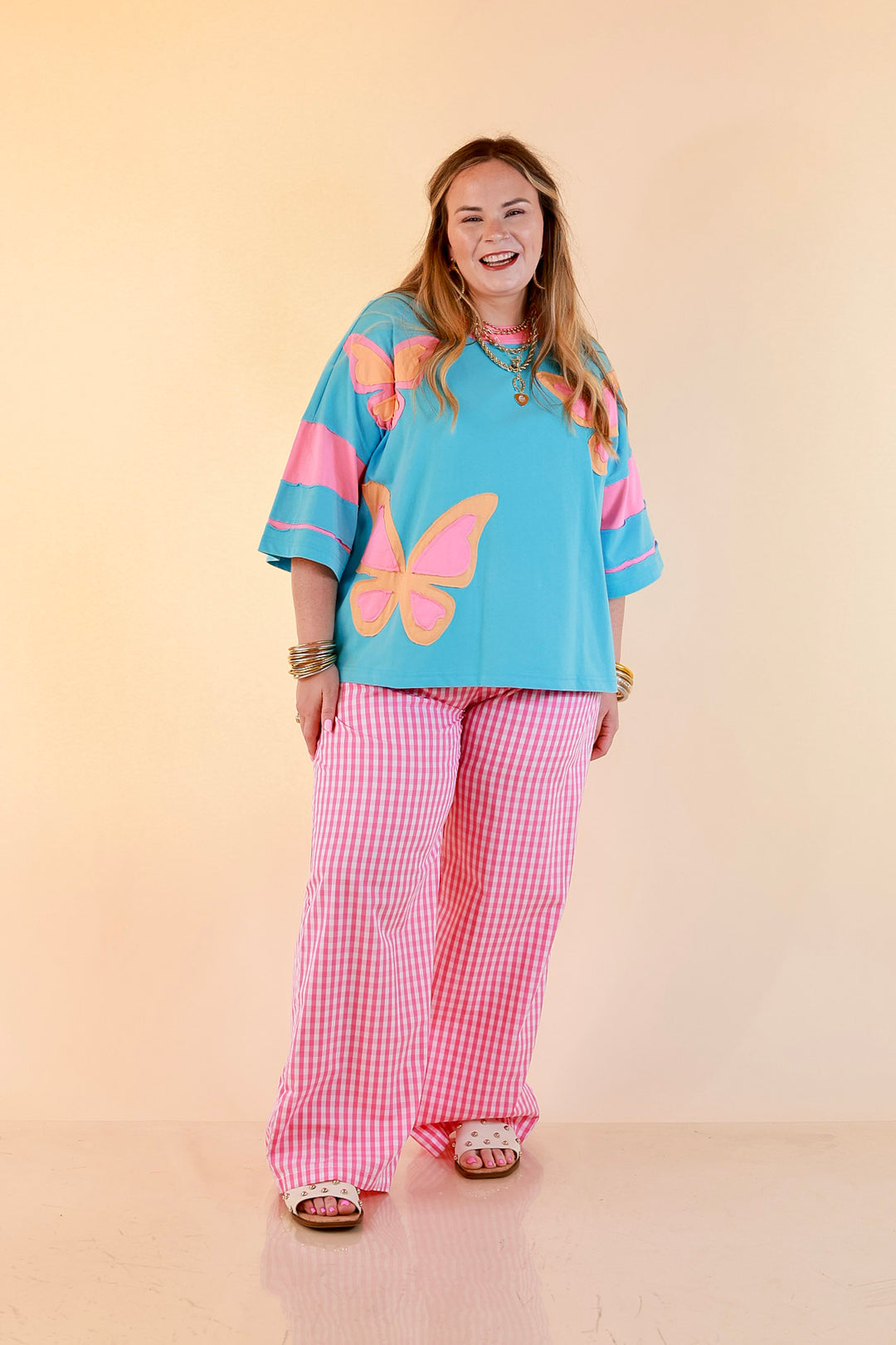 Dream in Color Butterfly Print Relaxed Short Sleeve Top with Contrast Sleeves in Turquoise Blue