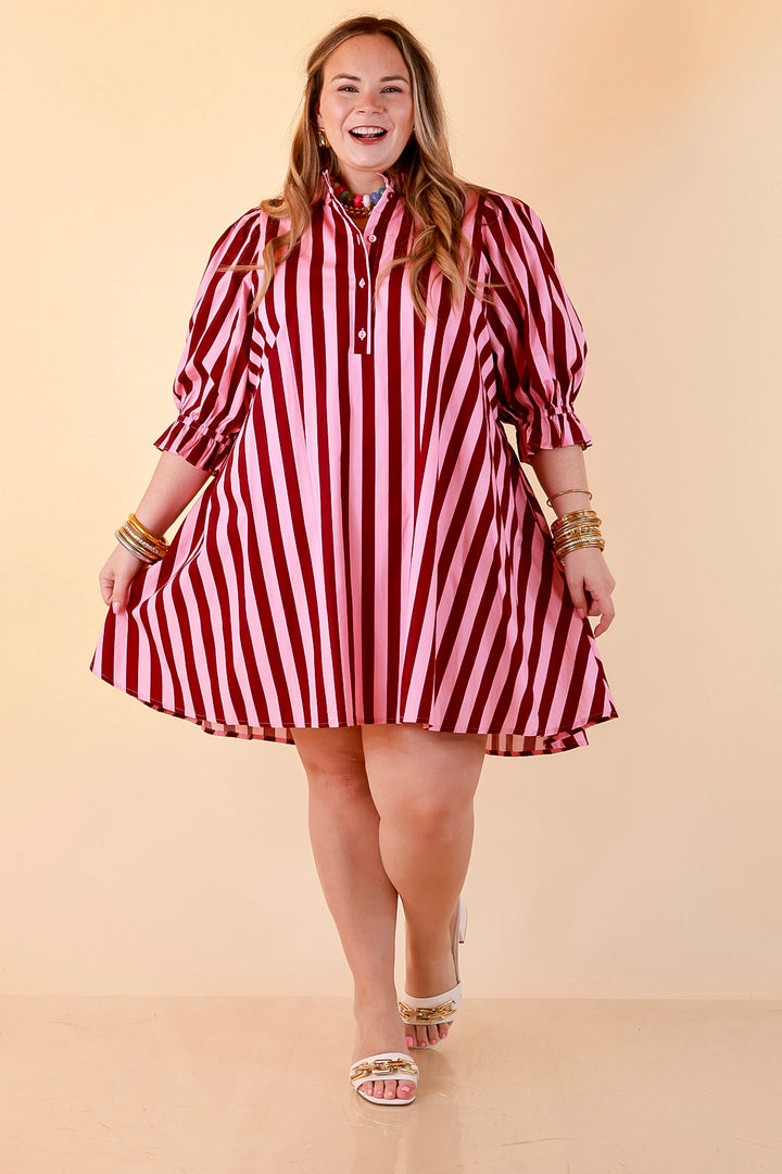 Talk of the Town Striped Ruffle Sleeve Babydoll Dress with Cinched Waist Feature in Maroon and Pink