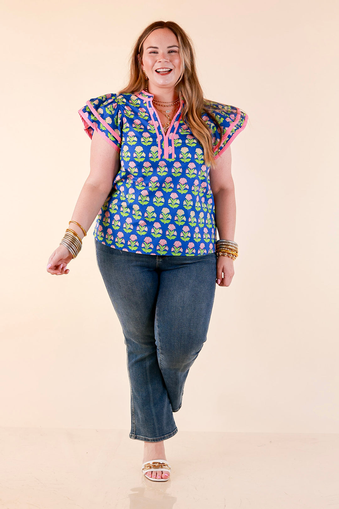 Fresh Perspective V Neck Floral Print Top with Ruffle Cap Flutter Sleeves and Contrast Trim in Royal Blue