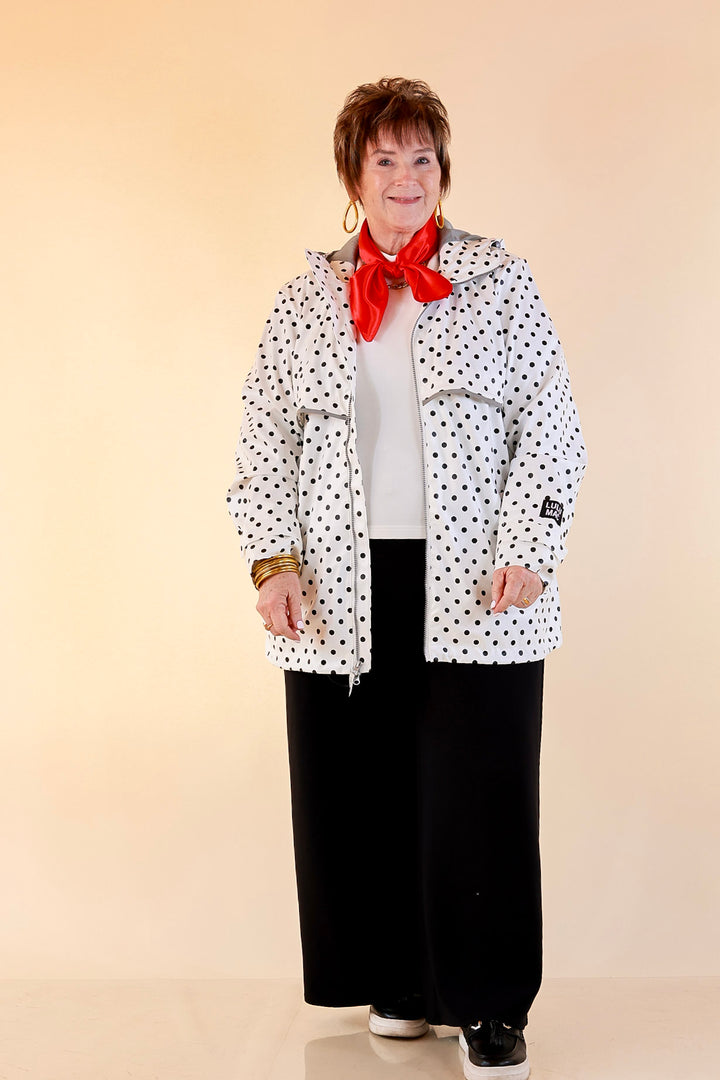 Lulu Mac | Chic Forecast Black Polka Dot Hooded Rain Jacket in Ivory