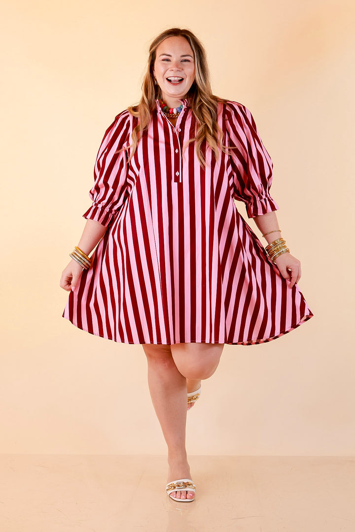 Talk of the Town Striped Ruffle Sleeve Babydoll Dress with Cinched Waist Feature in Maroon and Pink
