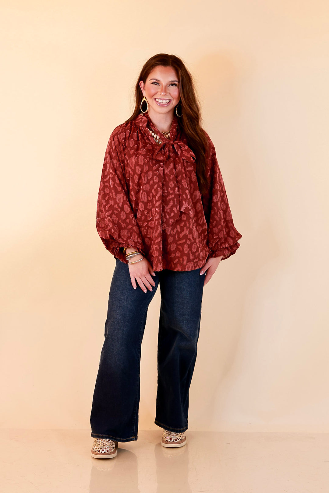 Commanding Attention Tie Neck Velvet Animal Print Balloon Sleeve Blouse in Burgundy