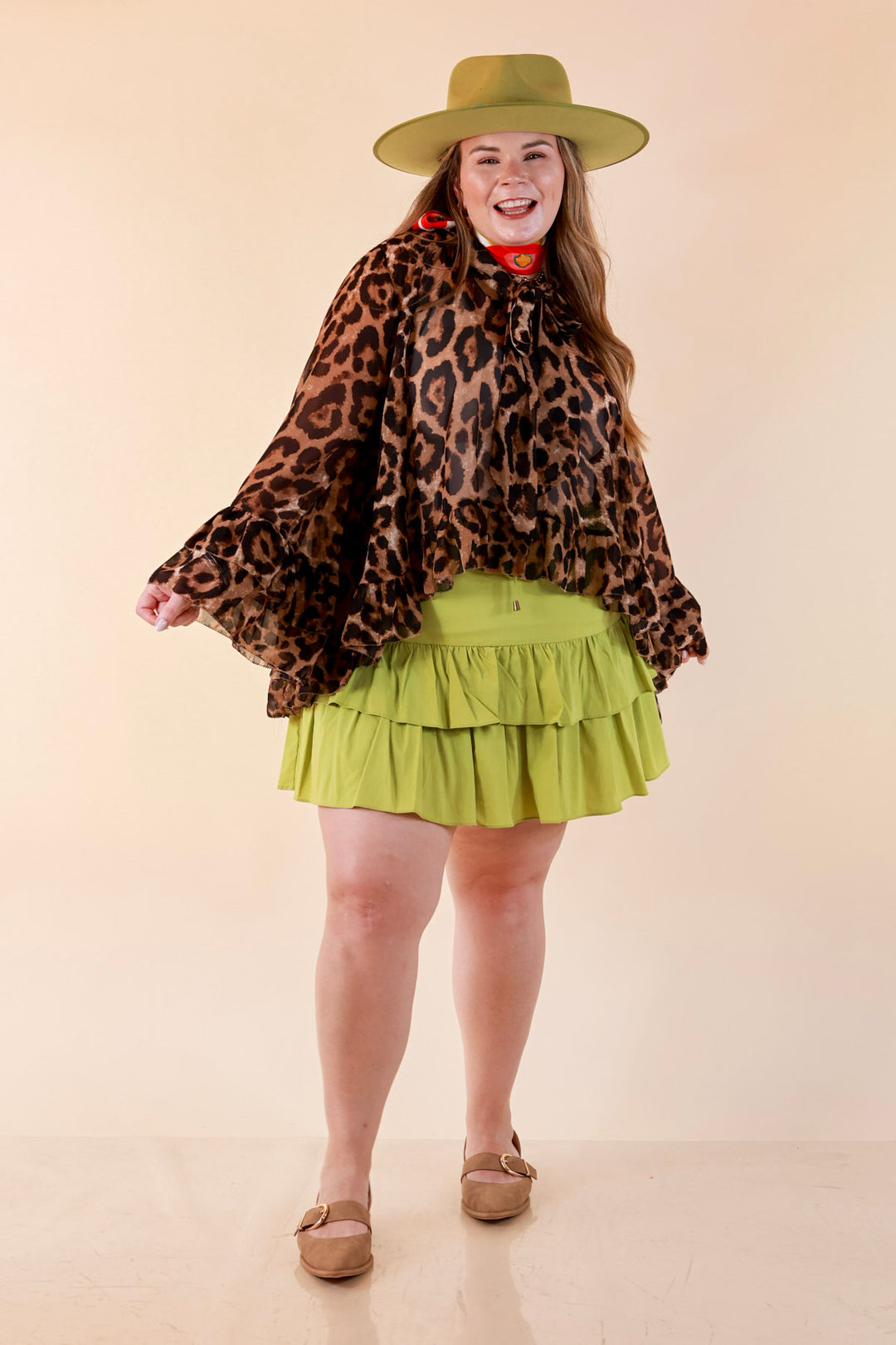 Flirt Factor Long Sleeve Sheer Blouse with Bell Sleeves and Ruffle Detailing and Tie Collar in Leopard Print