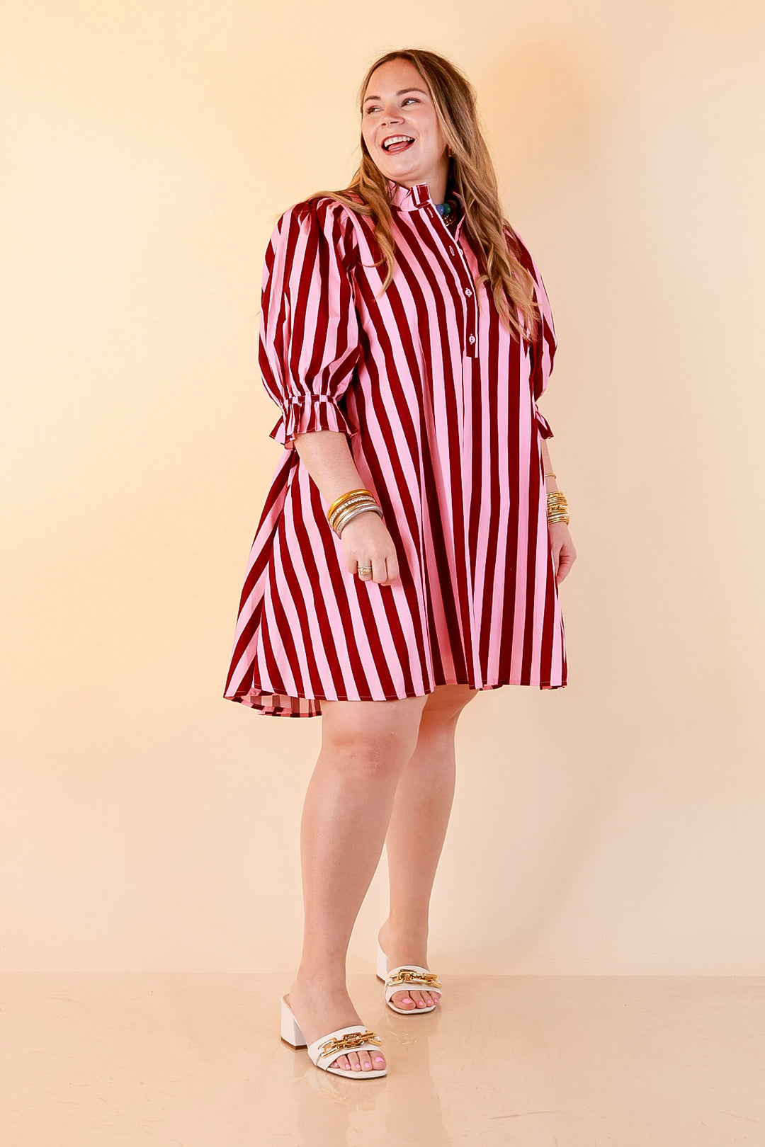 Talk of the Town Striped Ruffle Sleeve Babydoll Dress with Cinched Waist Feature in Maroon and Pink