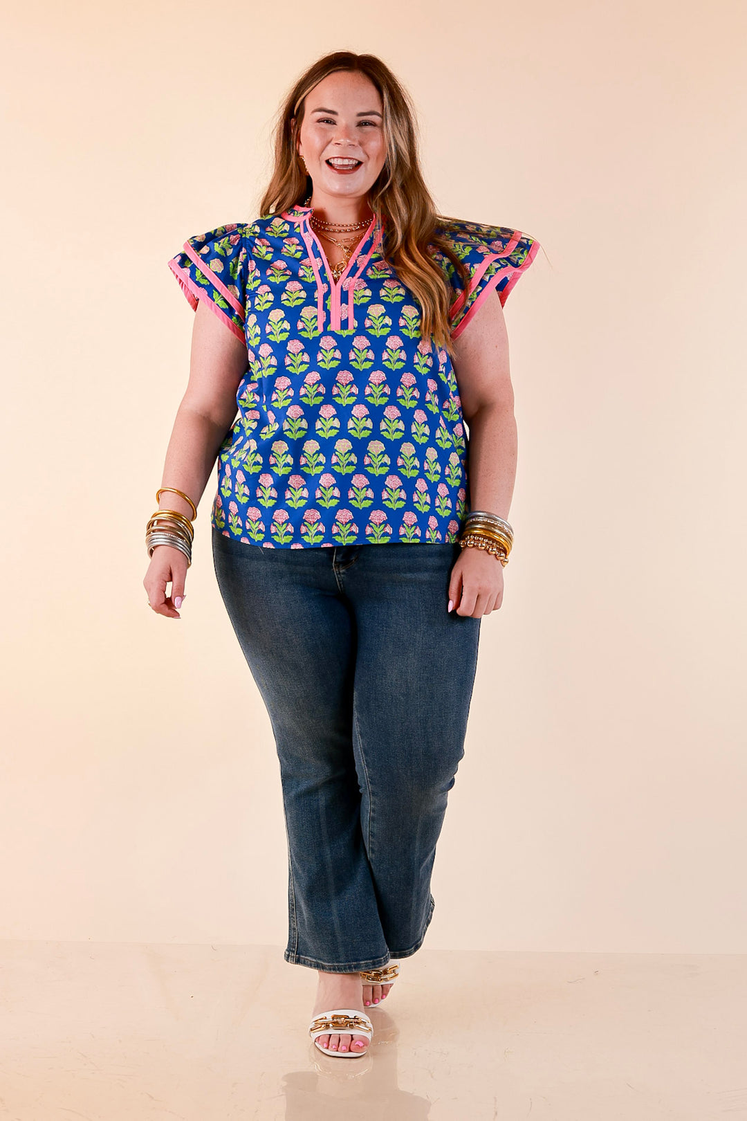 Fresh Perspective V Neck Floral Print Top with Ruffle Cap Flutter Sleeves and Contrast Trim in Royal Blue